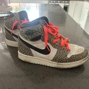 Nike High-Top Sneakers with Orange Laces and Black Swoosh